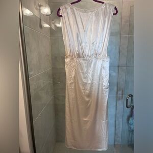 White satin midi dress with side cutouts